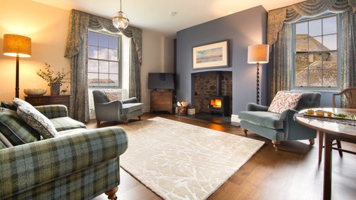 The sitting room, with a sea view, at Pengirt, Cornwall